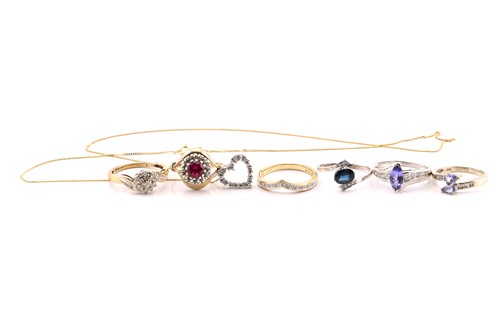 Lot 230 - A collection of gem-set rings and a pendant on...