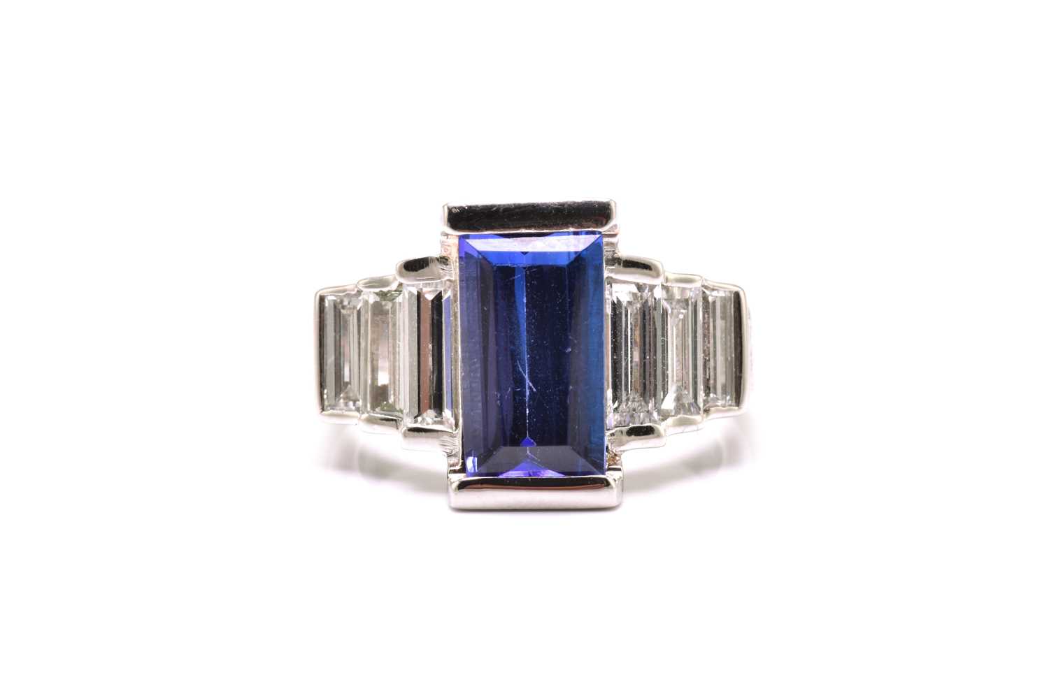 Lot 75 - An Art Deco-style platinum tanzanite and...