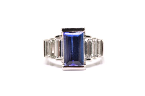 Lot 75 - An Art Deco-style platinum tanzanite and...