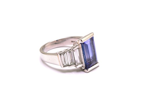 Lot 75 - An Art Deco-style platinum tanzanite and...