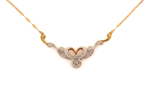 Lot 254 - A diamond necklace in tri-coloured precious...