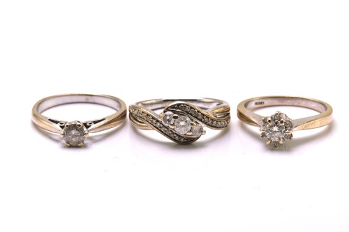 Lot 21 - Three diamond rings in yellow gold, one...