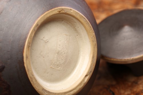 Lot 340 - Lucie Rie (1902-1995), a manganese glaze...