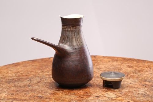 Lot 340 - Lucie Rie (1902-1995), a manganese glaze...