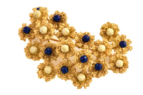 Lot 221 - An enamelled abstract brooch, comprises an...