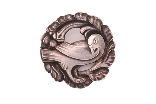 Lot 178 - Georg Jensen - An embossed silver brooch,...