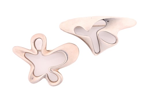 Lot 327 - Georg Jensen - two abstract silver brooches,...
