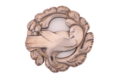 Lot 156 - Georg Jensen - An embossed silver brooch,...