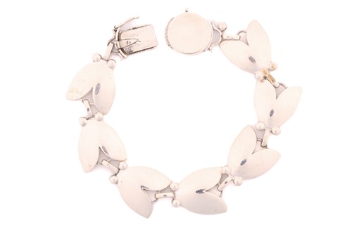 Lot 351 - Georg Jensen - a tulip bracelet, with stylised...
