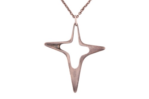Lot 317 - Georg Jensen - An abstract cross necklace,...