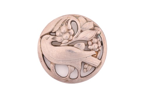 Lot 337 - Georg Jensen - An embossed brooch, depicting a...