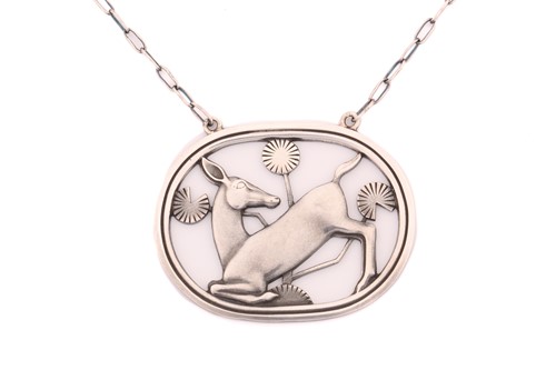 Lot 321 - Georg Jensen - a necklace with kneeling deer...