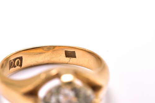 Lot 153 - A diamond belcher ring, featuring an old mine...