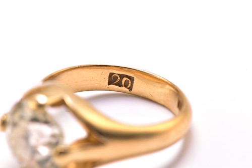 Lot 153 - A diamond belcher ring, featuring an old mine...