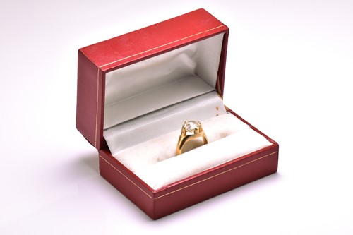 Lot 153 - A diamond belcher ring, featuring an old mine...