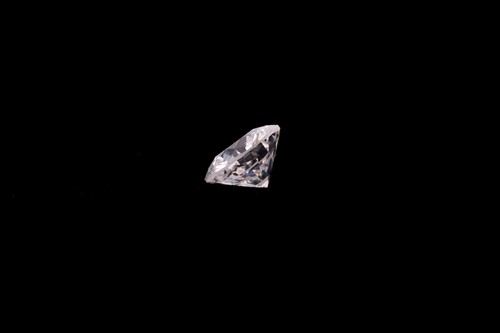 Lot 225 - A loose diamond, the round brilliant-cut white...