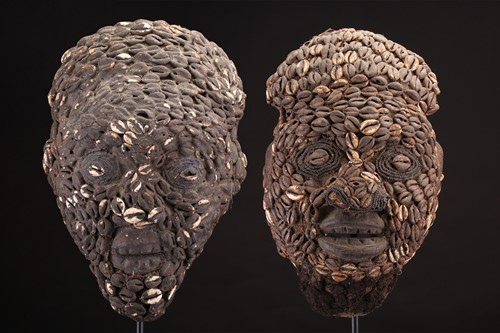Lot 256 - Two Bamileke Kam masks, Cameroon, each covered...