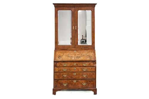 Lot 131 - A George I walnut bureau bookcase the upper...