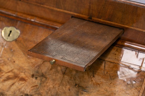 Lot 131 - A George I walnut bureau bookcase the upper...