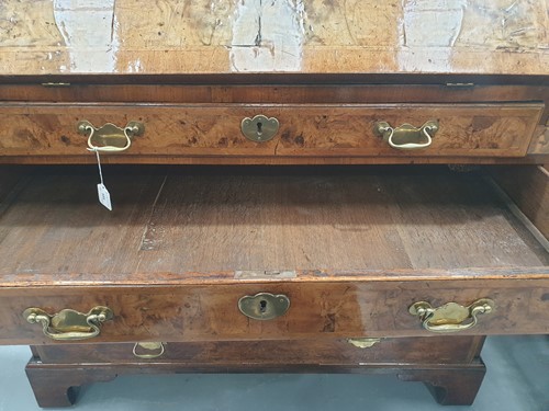 Lot 131 - A George I walnut bureau bookcase the upper...