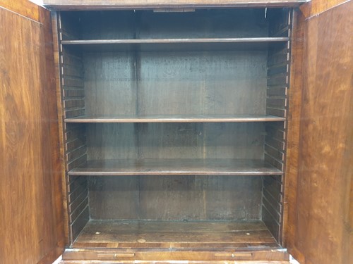 Lot 131 - A George I walnut bureau bookcase the upper...