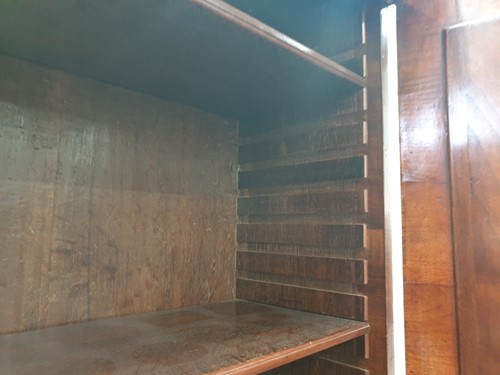 Lot 131 - A George I walnut bureau bookcase the upper...