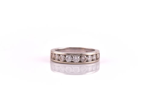 Lot 51 - A diamond half eternity ring, consisting of...