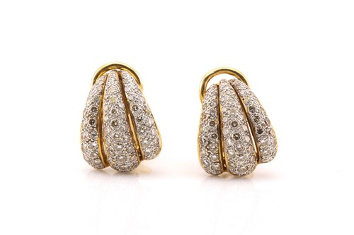 Lot 166 - A pair of diamond clip-on earrings, each fully...