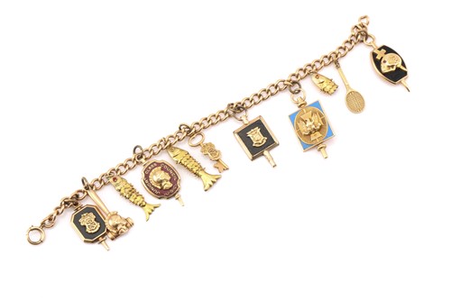 Lot 28 - A gold-filled bracelet with assorted college...