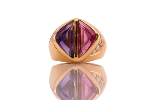 Lot 245 - A two-tone dress ring with amethyst and...