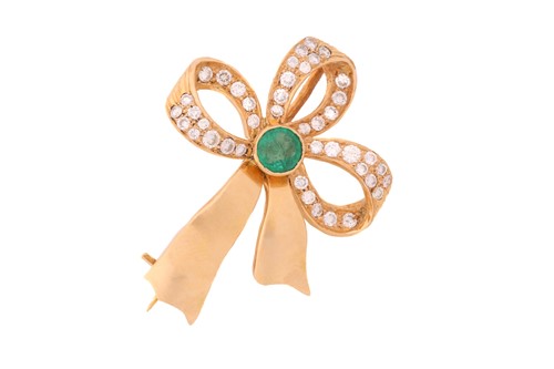 Lot 261 - A gem-set bow brooch in yellow metal,...
