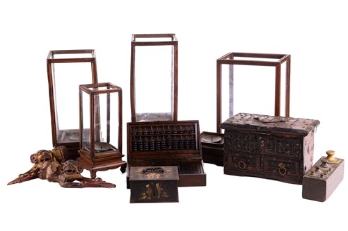 Lot 69 - Four Burmese carved wood lanterns, with glazed...