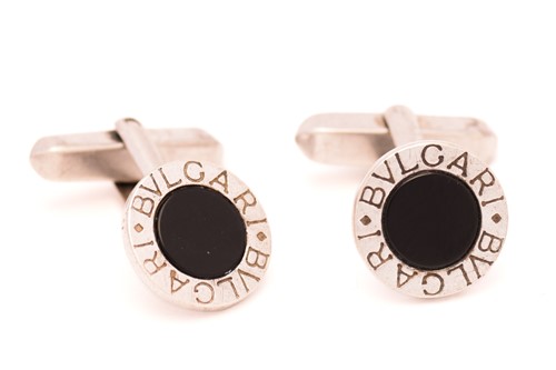 Lot 233 - Bvlgari - A pair of onyx cufflinks, each...