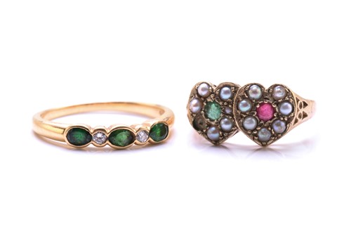 Lot 200 - A Tsavorite and diamond half loop ring and a...