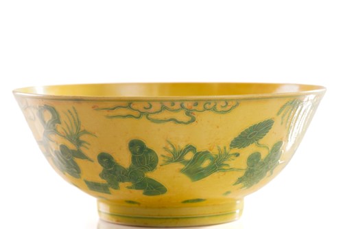 Lot 152 - A Chinese porcelain yellow ground bowl, with...