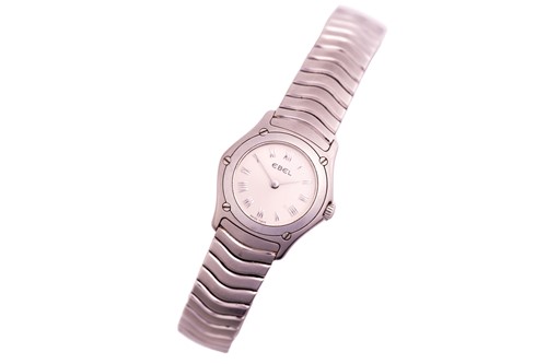 Lot 346 - An Ebel classic wave lady's steel wristwatch,...