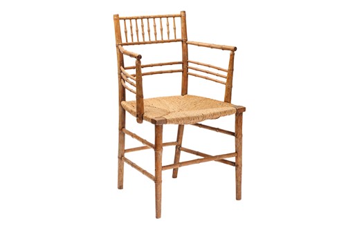 Lot 15 - A 19th-century "Sussex" type open armchair...