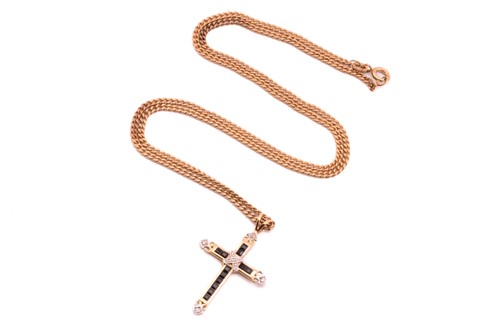 Lot 232 - A sapphire and diamond cross necklace in 9ct...