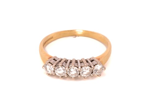 Lot 212 - A five-stone diamond ring in 18ct gold,...