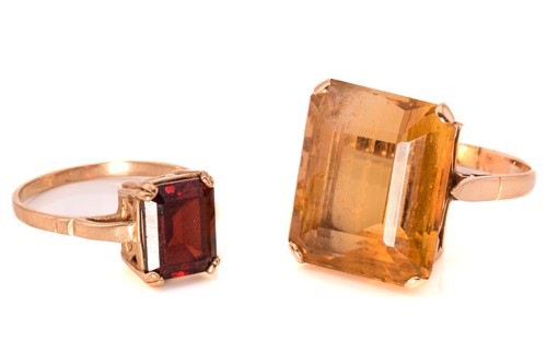 Lot 227 - A 9ct gold and garnet ring and a large citrine...
