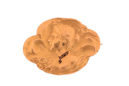 Lot 87 - A French Art Nouveau habillé portrait brooch,...