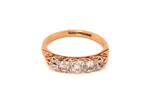 Lot 133 - A five-stone diamond half hoop ring, with five...