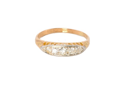 Lot 216 - A five-stone diamond half hoop ring, composed...