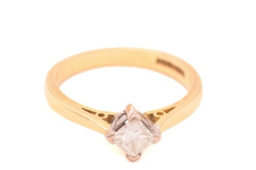 Lot 151 - A princess-cut diamond solitaire ring in 18ct...