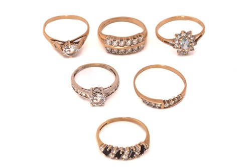 Lot 64 - A selection of gem-set rings; to include a CZ...