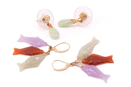 Lot 203 - Two pairs of jadeite earrings; including a...