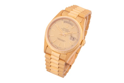 Lot 332 - An unworn Rolex Daydate 18038 in 18ct yellow...