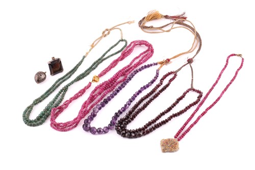 Lot 73 - A mixed lot of bead necklaces and two gem-set...