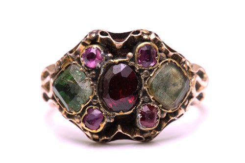 Lot 247 - A gem-set dress ring in yellow metal,...