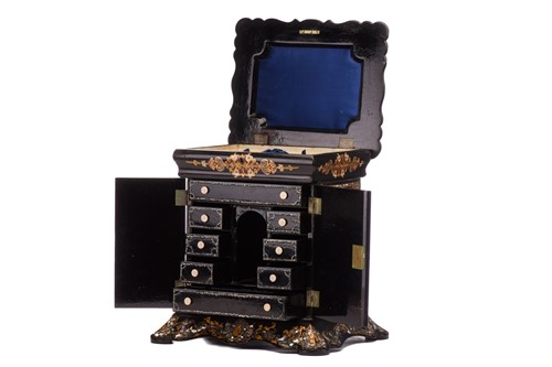 Lot 179 - A Victorian papier mache table writing cabinet,...